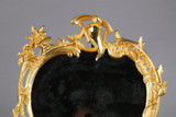 Miroir Napoléon 3 en bronze doré Miroir Napoléon 3 en bronze doré