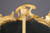 Miroir chantourné doré, d'époque 19e Miroir chantourné doré, d'époque 19e
