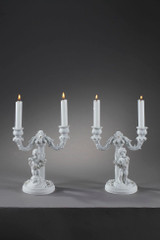 Pair of candlesticks in biscuit