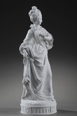 Woman in ball gown with fan
