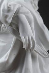 Porcelain sculpture of a woman at a ball