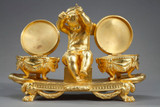 INKWELL IN GILDED BRONZE, "L'AMOUR TIMBALIER", IN THE LOUIS XVI STYLE