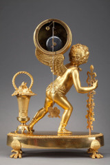 CLOCK "AU COLPORTEUR" IN BRONZE, RESTORATION PERIOD