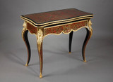 Boulle inlay with brass background and red tortoiseshell inlay