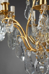 EIGHT-ARM GILDED BRONZE CHANDELIER WITH PENDANTS