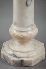 Pedestal in veined marble