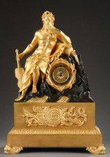 A CLOCK IN GILDED AND PATINATED BRONZE: A RIVER GOD, THE TIBRE.