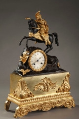 HORLOGE ANCIENNE AU CAVALIER EN BRONZE DORE ET PATINE, 19EME SIECLE HORLOGE ANCIENNE AU CAVALIER EN BRONZE DORE ET PATINE, 19EME SIECLE