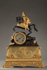 HORLOGE ANCIENNE AU CAVALIER EN BRONZE DORE ET PATINE, 19EME SIECLE HORLOGE ANCIENNE AU CAVALIER EN BRONZE DORE ET PATINE, 19EME SIECLE