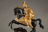 HORLOGE ANCIENNE AU CAVALIER EN BRONZE DORE ET PATINE, 19EME SIECLE HORLOGE ANCIENNE AU CAVALIER EN BRONZE DORE ET PATINE, 19EME SIECLE