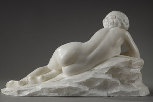 Reclining nude woman sculpture