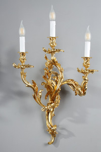 Pair of three-arm sconces