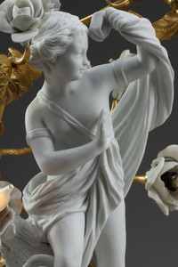 Pair of Eros and draped Venus candelabra porcelain biscuits