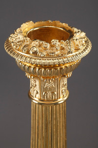 LARGE RESTORATION CANDLESTICKS IN GILDED BRONZE DECORATED WITH SWANS