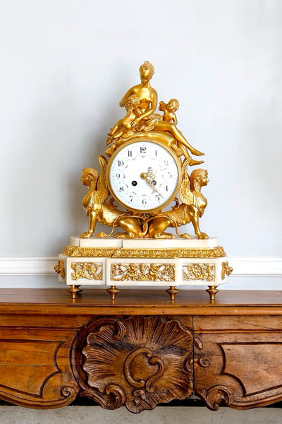 LOUIS XVI STYLE GILT BRONZE AND WHITE MARBLE CLOCK
