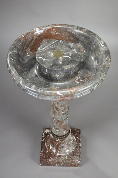 Grey and red marble bird bath