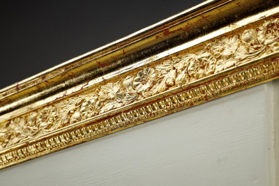 Antique-style mirror in stucco and gilded wood