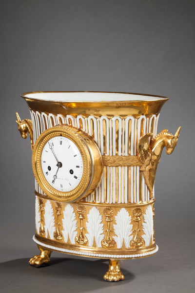 Gilt porcelain clock in the shape of a vase, early 19th century