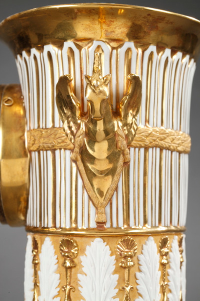 Gilt porcelain clock in the shape of a vase, early 19th century