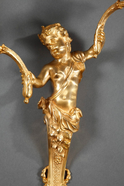 PAIRE D'APPLIQUES DE STYLE LOUIS XV EN BRONZE DORÉ