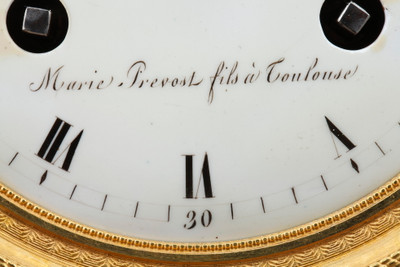 Empire period clock with a putto in a chariot