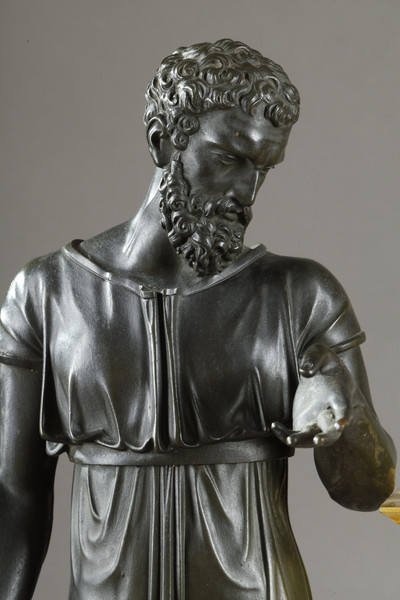 Antique clock inspired by Greek mythology