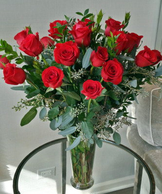 Thinking About Valentine's Day Yet? Get your order in today for those red roses.  Order local, but convenient.