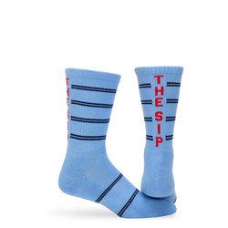 Powder blue athletic casual crew socks with double navy blue stripes and "THE SIP" written up the back of the leg. Powder blue athletic casual crew socks with double navy blue stripes and "THE SIP" written up the back of the leg.