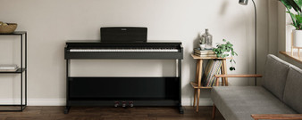 Yamaha YDP105R Rosewood Console Digital Piano. Includes PA150 Power Adapter And BC108DR Piano Bench.