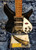 Rickenbacker 350V63 Jet Glo Liverpool, 3 Pickup, Semi-Hollow, White Pickguard, 21 Fret, Full Size Neck, Black (350V63 JG) Rickenbacker 350V63 Jet Glo Liverpool, 3 Pickup, Semi-Hollow, White Pickguard, 21 Fret, Full Size Neck, Black (350V63 JG)