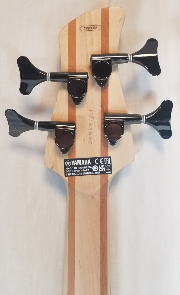 Yamaha TRBX304 Solid Mahogany Body 4 String Electric Bass Guitar, Factory Blue.