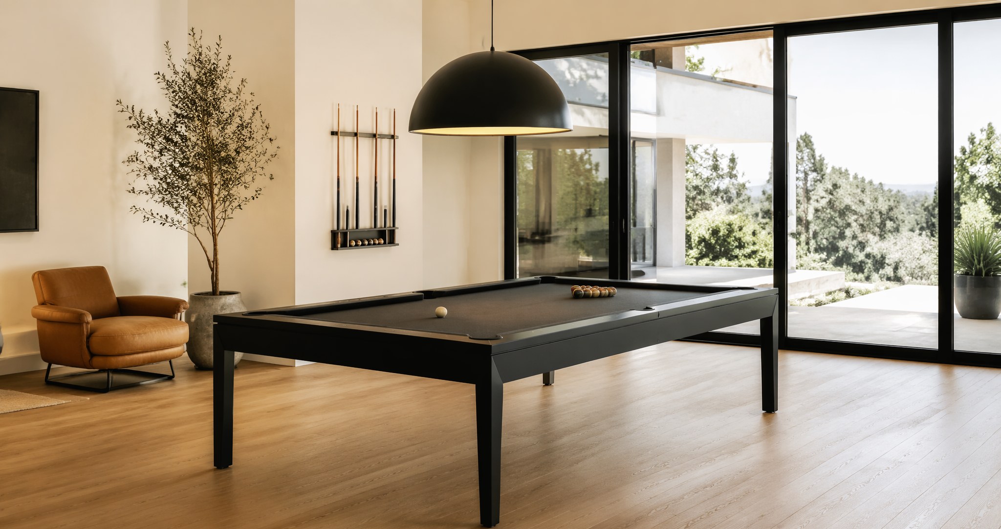 Modern game room with a matte-black slate pool table