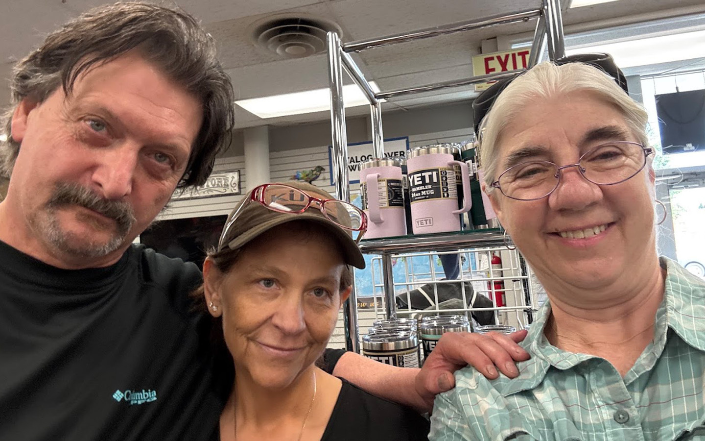 Richard with longtime customers at 6th Avenue Outfitters