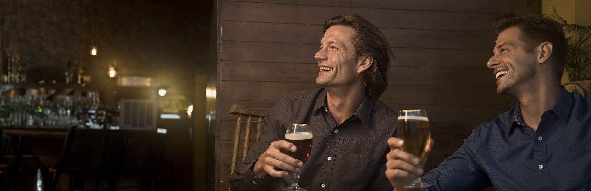 man looking at waves