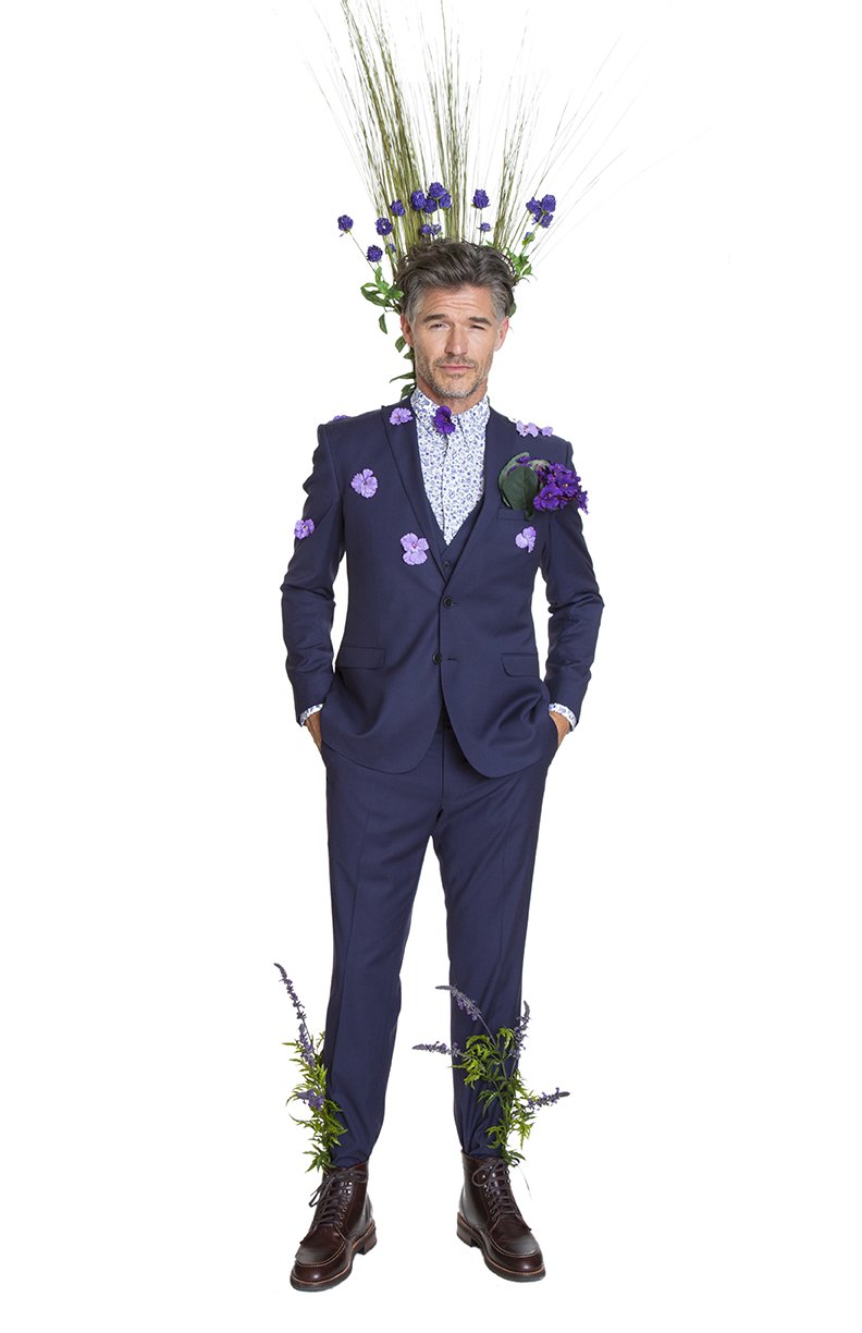 Man with flowers on suit