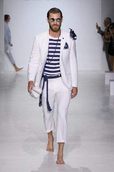 812668434-grande.jpg Man in white suit