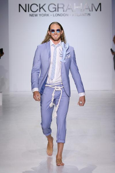 812668488-grande.jpg Man in light blue suit