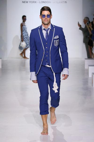 812668554-grande.jpg Man in dark blue suit