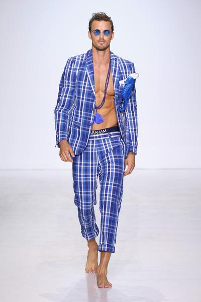 812668634-grande.jpg Man in striped suit