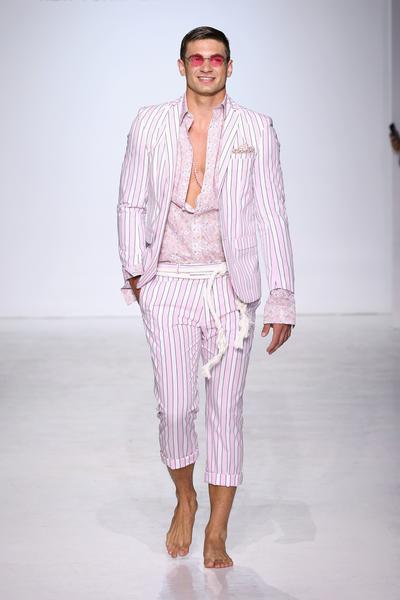 812668646-grande.jpg Man in pink striped suit