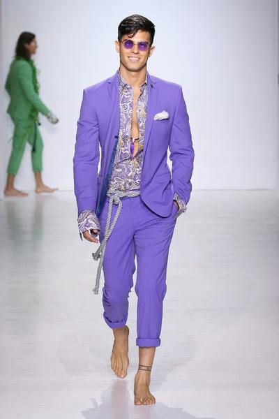 812668666-grande.jpg Man in purple suit