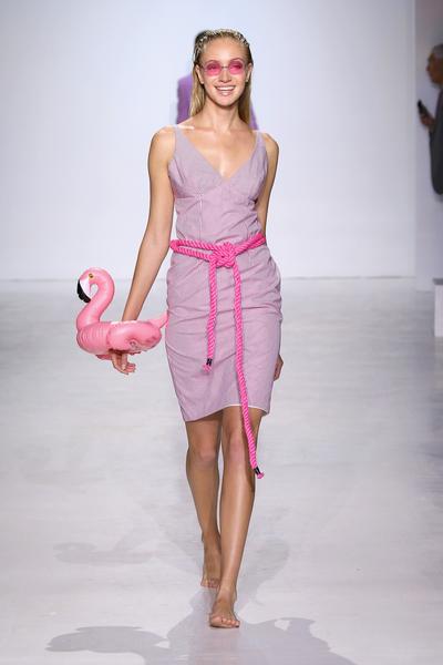 812668700-grande.jpg Women in pink dress