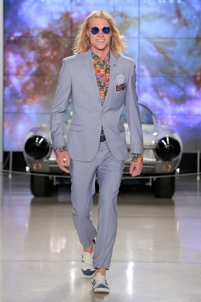 Man in a light grey suit