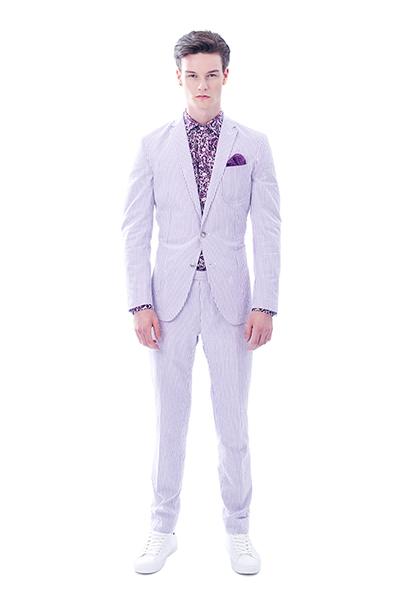 Man in light purple suit