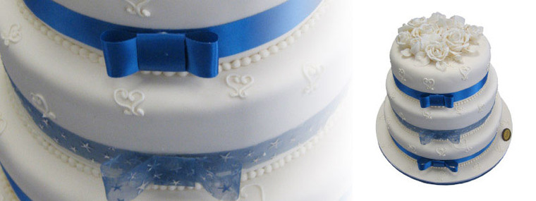 Wedding Cake Blue Ribbon and White Roses
