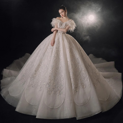 QueenLine Sequins Organza O-Neck Short Sleeves With Feathers Backless Wedding Dresses