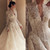 QueenLine Customized A-Line Appliques Lace Long Sleeve Floor-Length Wedding Dress
