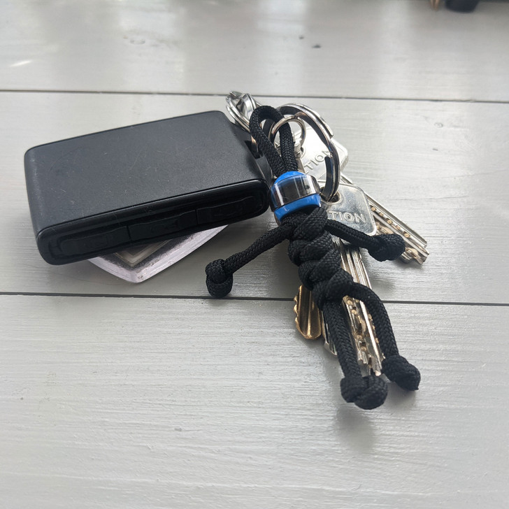 Black Racer With Blue Helmet Paracord Keyring Buddy