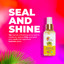 Woman with smooth shiny frizz-free, natural hair after using Alikay Naturals Lemongrass Sleek and Shine Finishing Oil 4oz