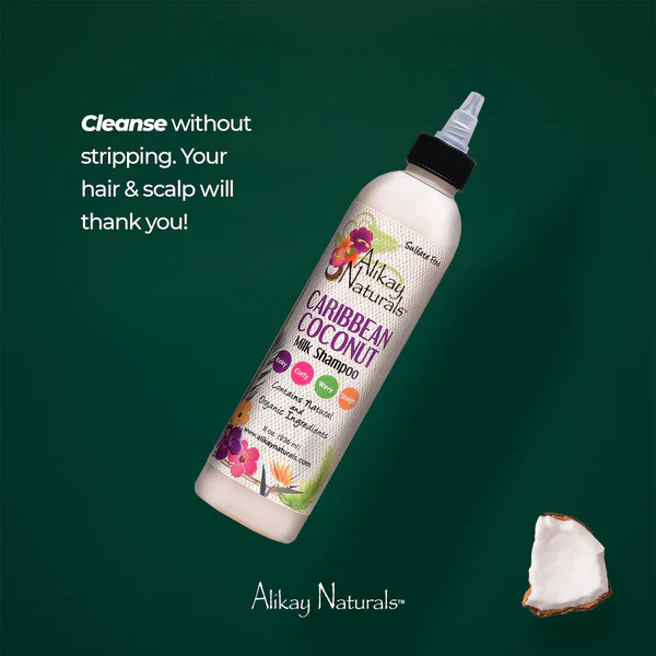 Woman washing natural curly hair with Alikay Naturals Caribbean Coconut Milk Shampoo for moisture and frizz control